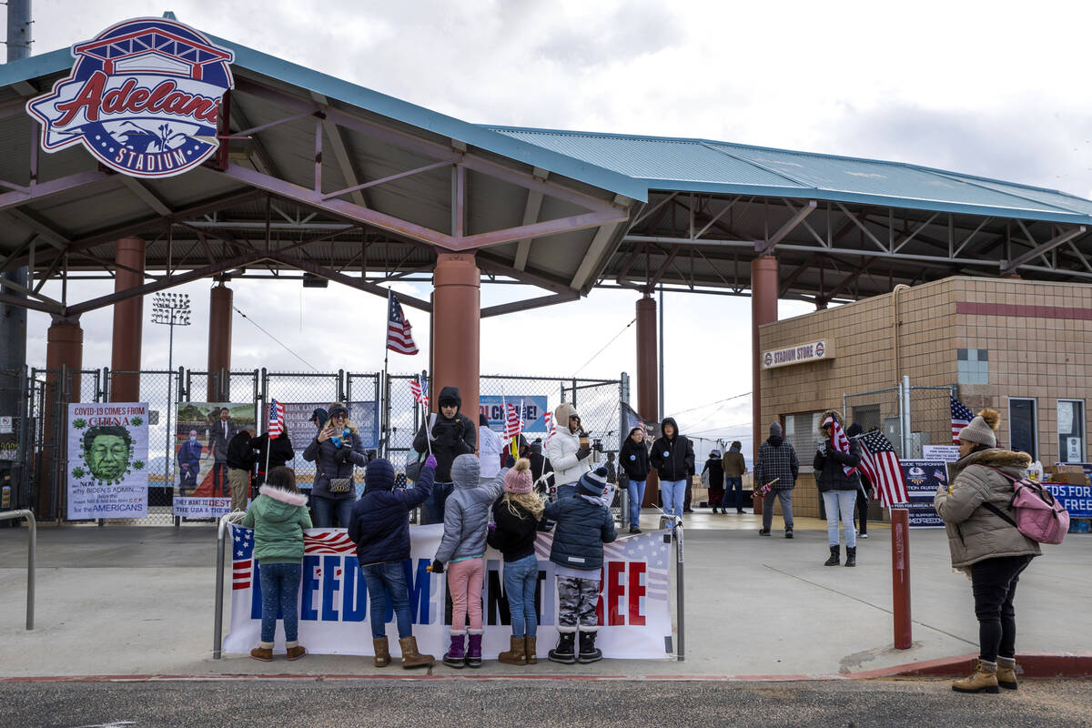 Attendees gather and celebrate during a departure event for The People’s Convoy at Adela ...