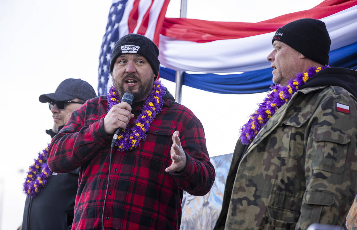 Trucker Brian Brase, center, thanks the crowd for their support during a departure event for Th ...