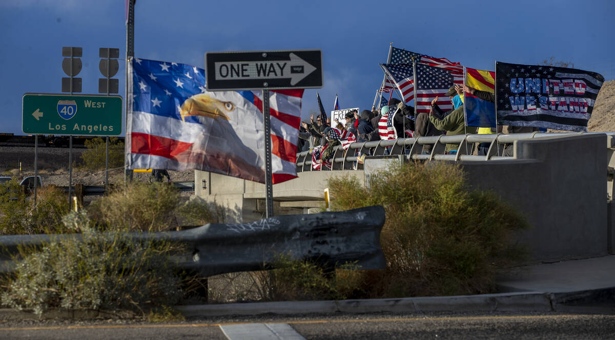 Supporters line an I-40 overpass in Arizona awaiting The People’s Convoy who departed Ad ...