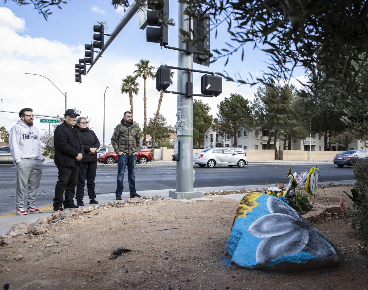 Relatives of Tina Tintor, including, her brother Djordje, left, her father Nedeljko, her aunt L ...