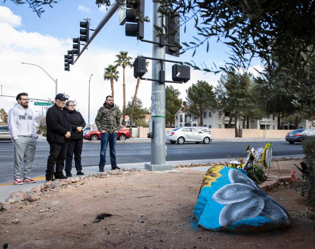 Relatives of Tina Tintor, including, her brother Djordje, left, her father Nedeljko, her aunt L ...