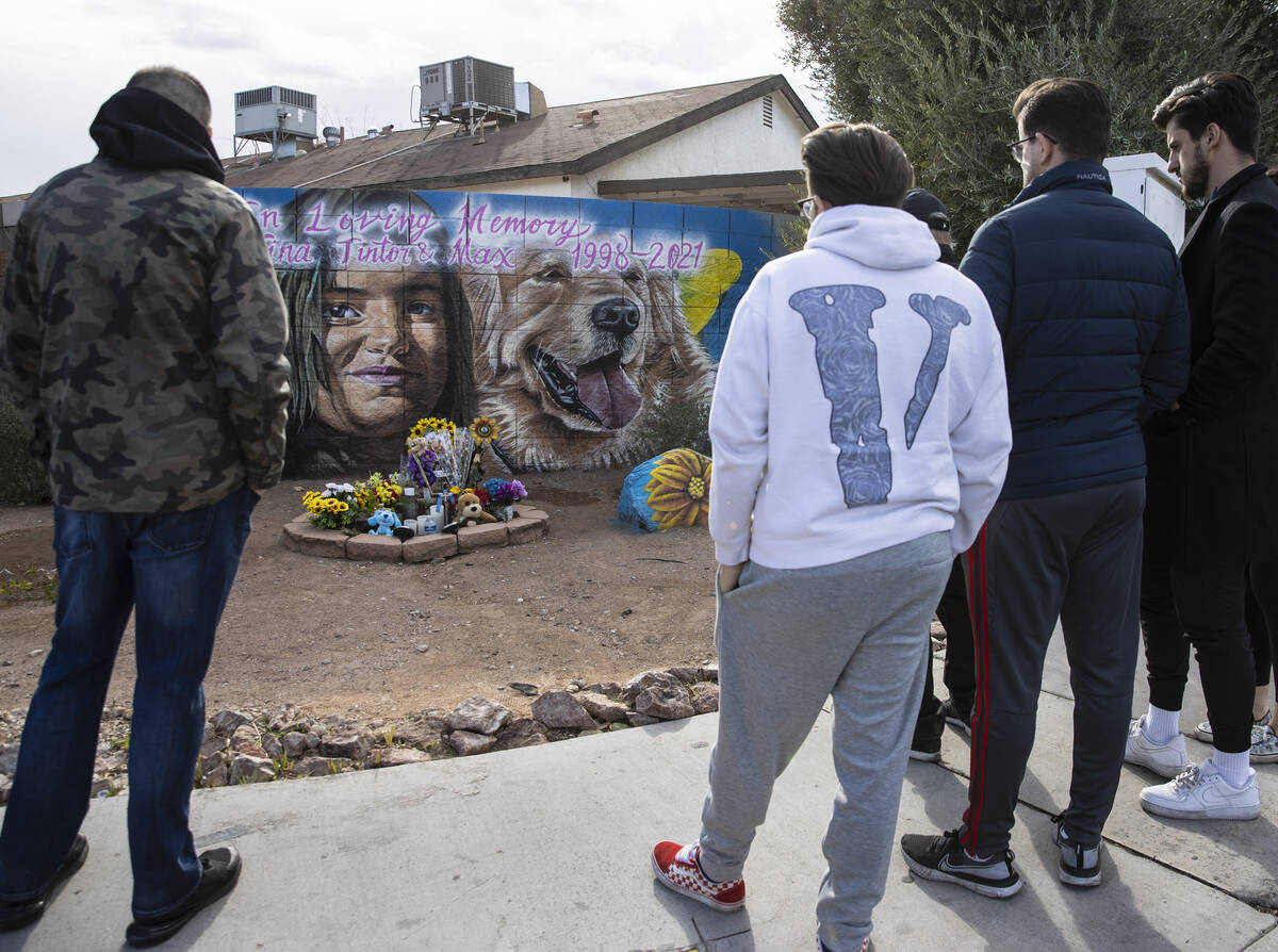 Relatives of Tina Tintor, including, her uncle Pedja Komazec, left, her brother Djordje, center ...