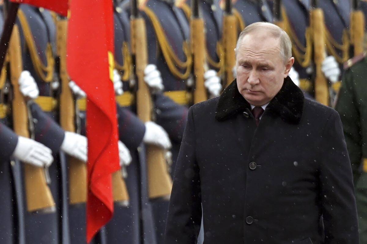 Russian President Vladimir Putin attends a wreath-laying ceremony at the Tomb of the Unknown So ...