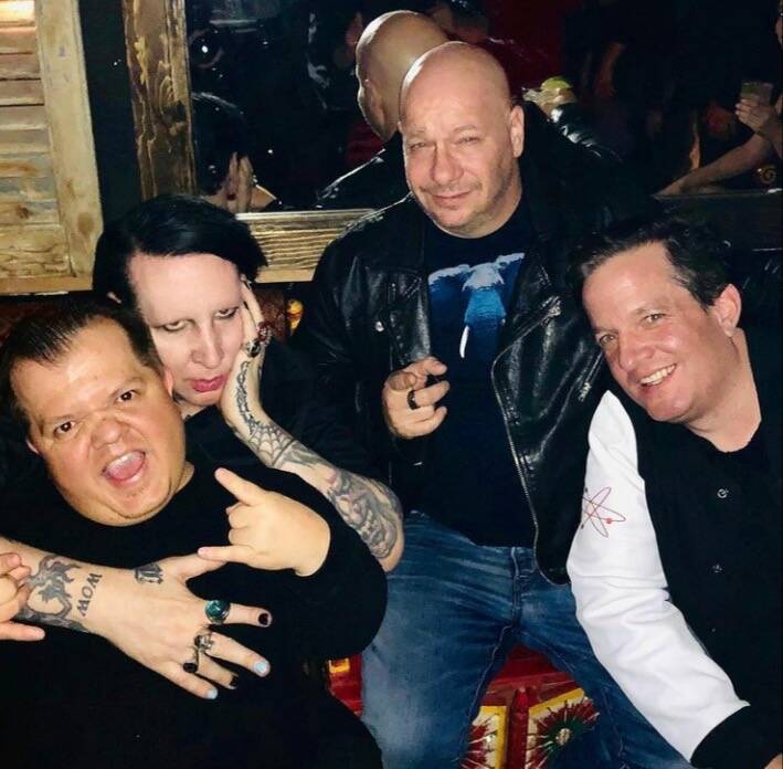 Donny Davis is shown Marilyn Manson, Jeff Ross and Jeff Beacher in this undated photo. Davis di ...