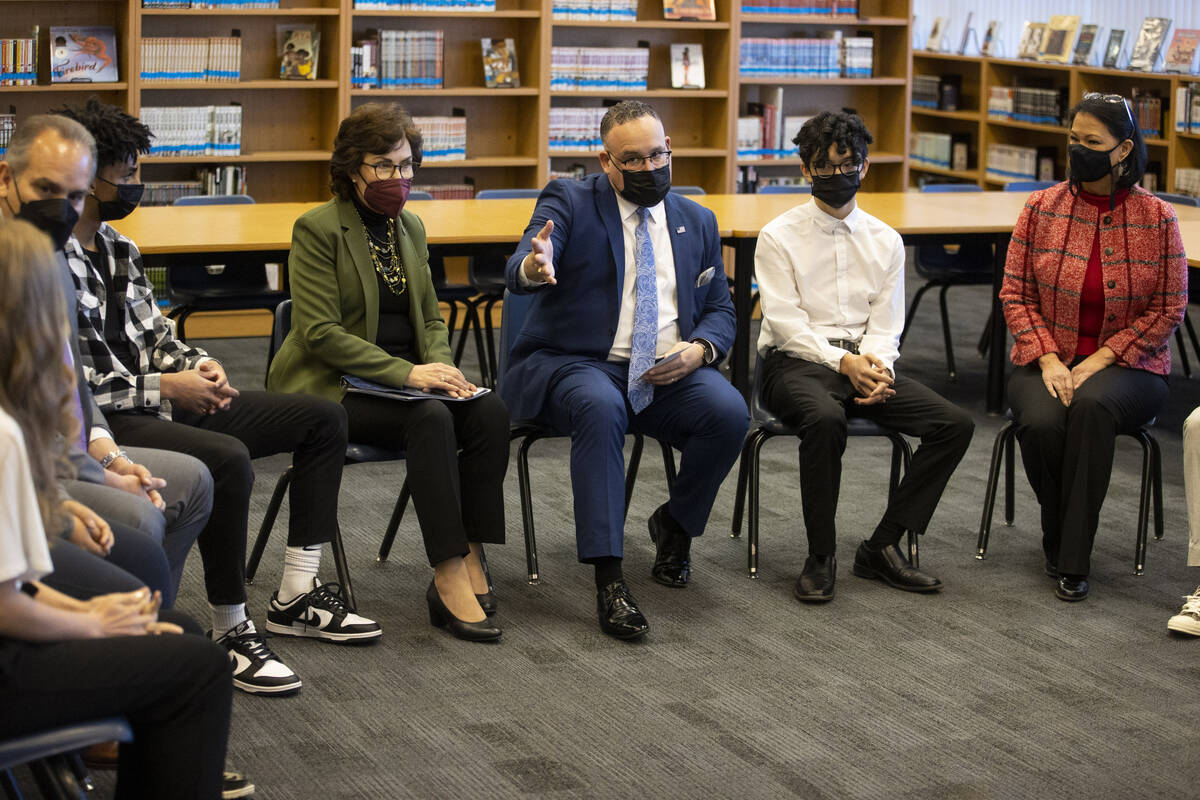 U.S. Secretary of Education Miguel Cardona, center, with U.S. Sen. Jacky Rosen, left, student M ...