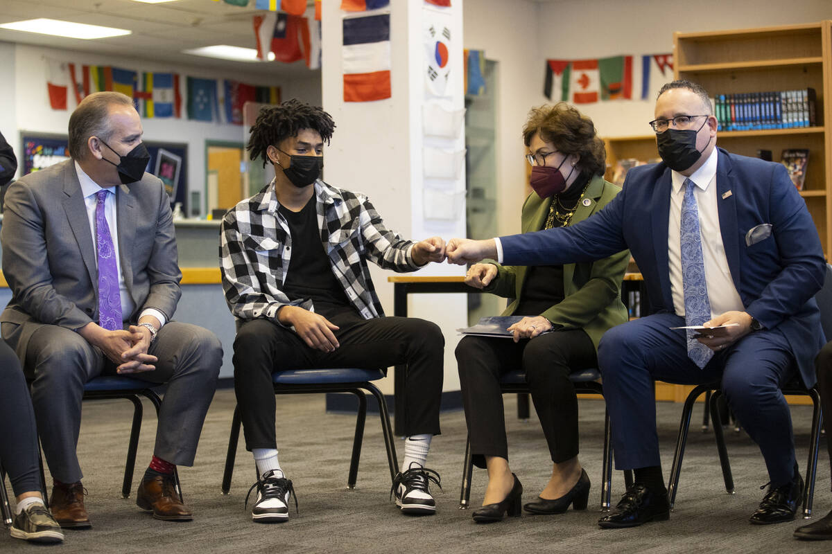 Clark County School District Superintendent Jesus Jara, from left, student Alijah Adem, U.S. Se ...