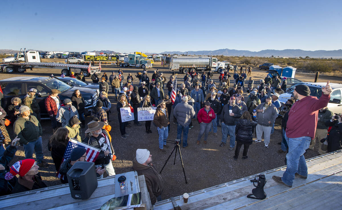 Co-organizer Brian Brase gives morning instructions to truckers of The People’s Convoy b ...