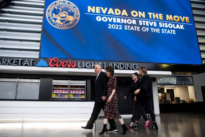 Nevada Gov. Steve Sisolak, from left, his wife Kathy, and daughters Carley and Ashley, enter Al ...