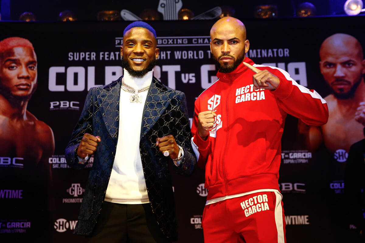 Undefeated junior lightweights Chris Colbert and Hector Luis Garcia pose for photos at the Cosm ...