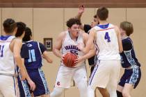 Green Valley Christian center Joshua Valencia (55) moves the ball against Adelson’s Juda ...