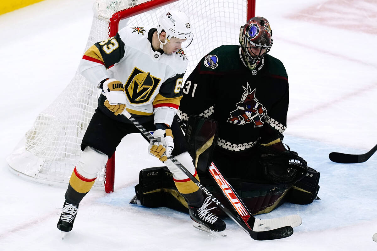 Arizona Coyotes goaltender Scott Wedgewood (31) makes a save on a deflection by Vegas Golden Kn ...