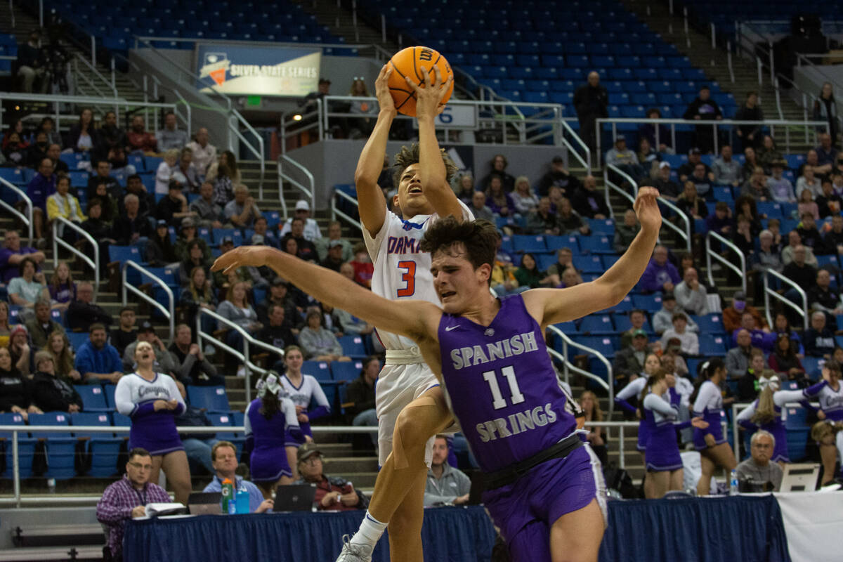 Bishop GormanÕs John Mobley drives to the basket during the NIAA Class 5A boys basketball ...