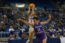 Bishop Gorman's John Mobley drives to the basket during the NIAA Class 5A boys basketball state ...