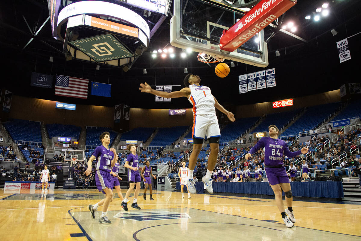 Bishop GormanÕs James Freeman scores during the NIAA Class 5A boys basketball state semifi ...