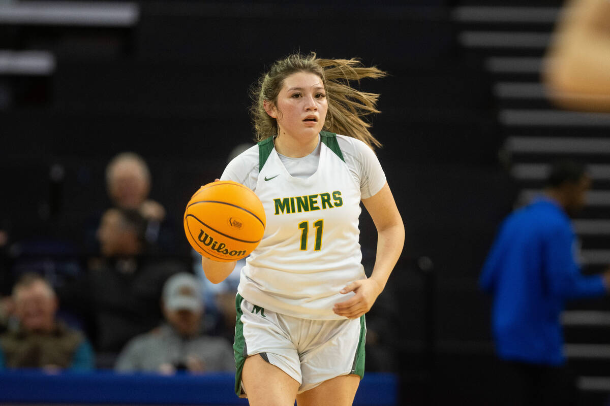 Bishop Manogues Jaileen Yarrow dribbles up the court against Spring Valley during the NIAA Clas ...