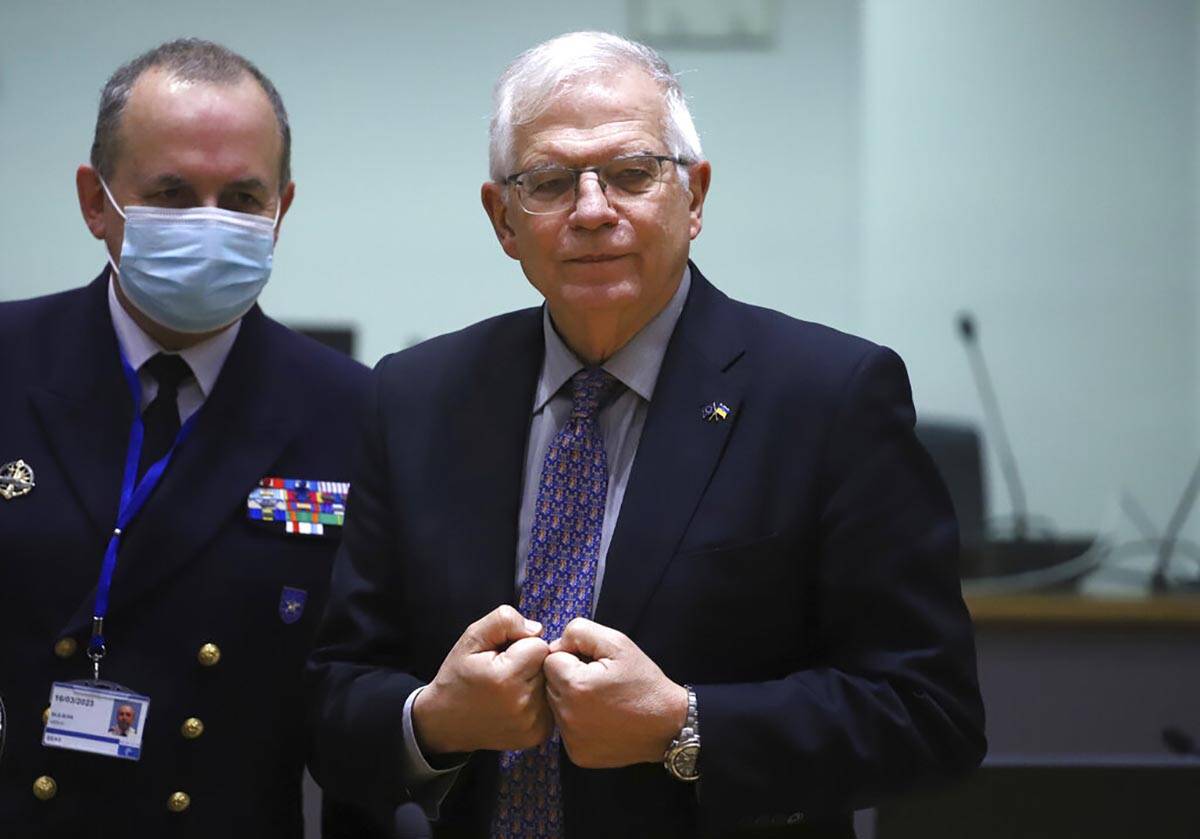 European Union foreign policy chief Josep Borrell, right, speaks with Director-General of the E ...
