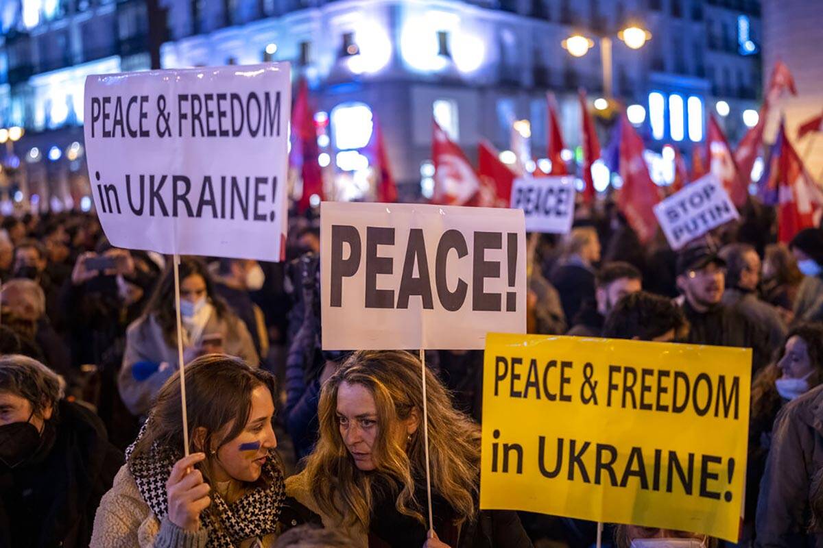 Protestors take part in a demonstration against Russia's military intervention in Ukraine at th ...