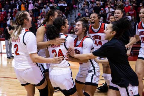 UNLV Lady Rebels guard Essence Booker (24) celebrates after reaching 1,000 career points and de ...