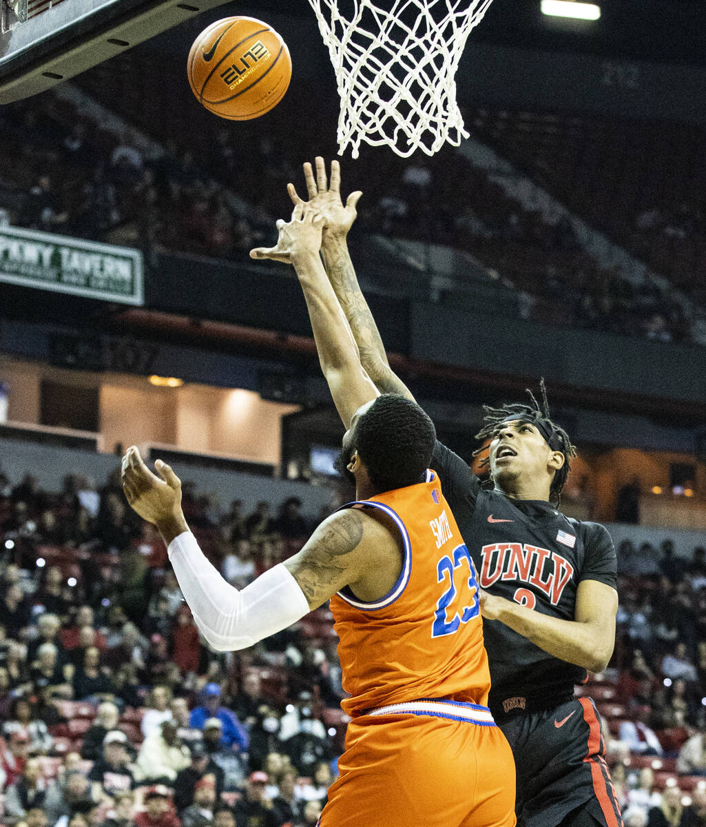 UNLV Rebels forward Donovan Williams (3) has his shot blocked by Boise State Broncos forward Na ...