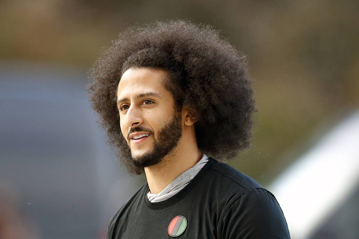 Colin Kaepernick arrives for a workout for NFL football scouts and media in Riverdale, Ga., in ...