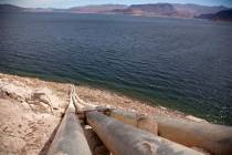FILE - This March 23, 2012, file photo, shows pipes extending into Lake Mead well above the hig ...