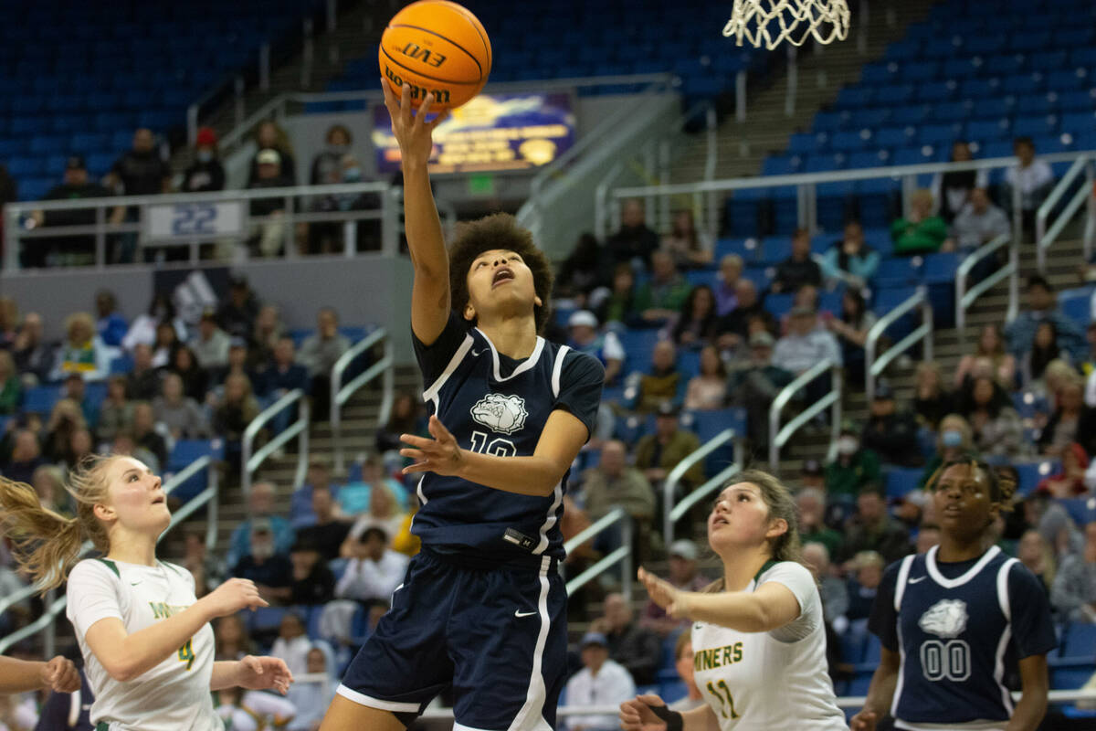 Montaya Dew of Centennial High School shoots during the NIAA Class 5A girls basketball state ch ...