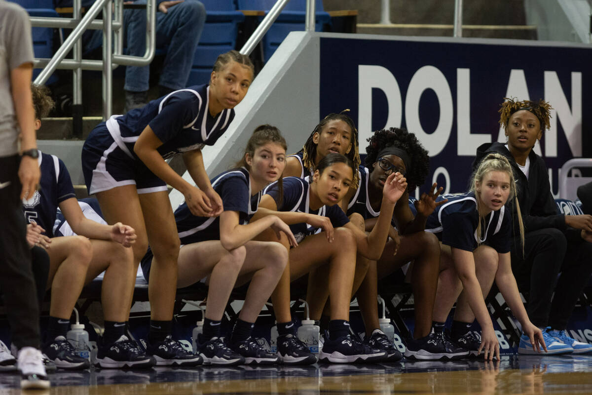 The Centennial High School bench cheers during the NIAA Class 5A girls basketball state champio ...
