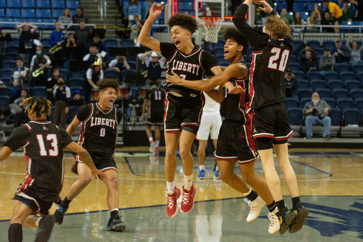 Liberty High School celebrates its win over Bishop Gorman in the NIAA Class 5A boys basketball ...