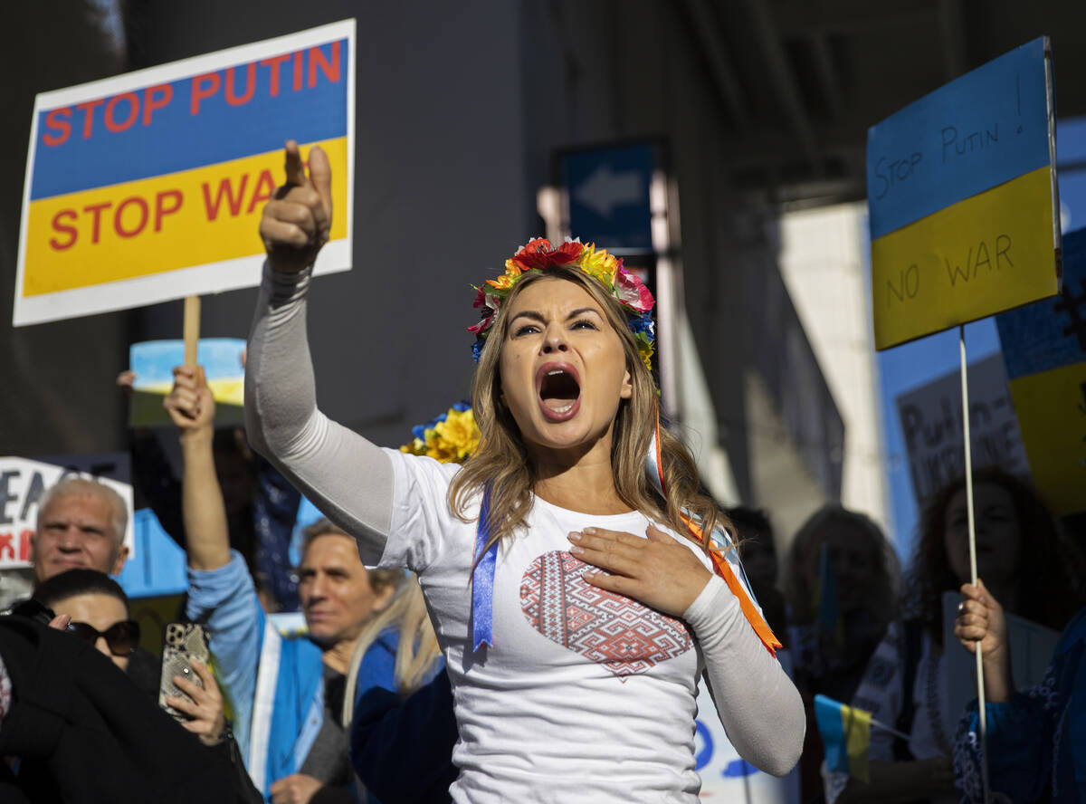 Jenny Arata, from Kyiv, Ukraine, leads demonstrators during a protest over the Russian invasion ...
