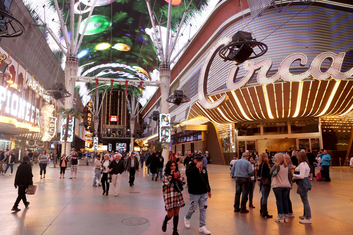 People walk at Circa at Fremont Street Experience in downtown las Vegas Wednesday, Dec. 8, 2021 ...