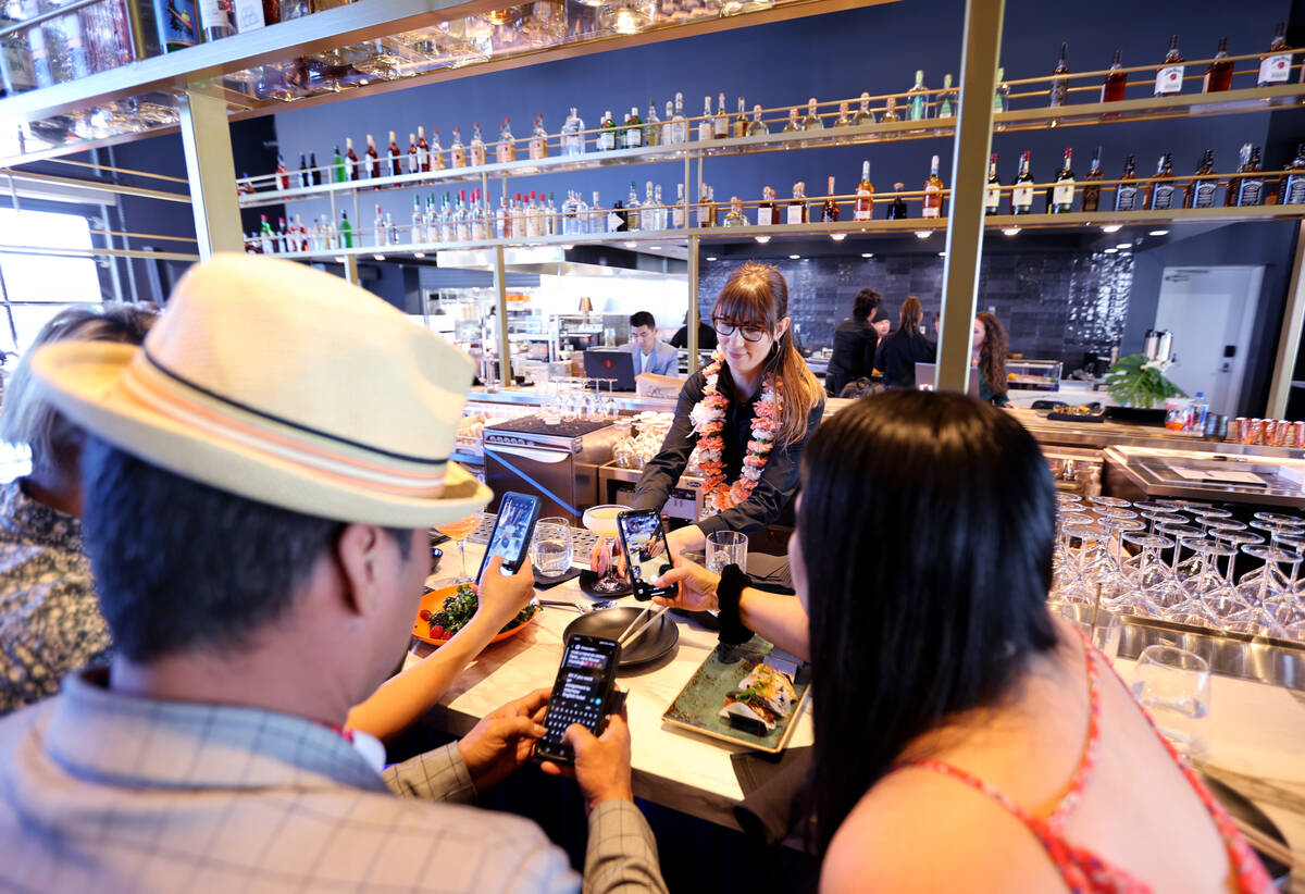 Bartender Erin Webster serves a Glitter Gulch at The Pepper Club at The English Hotel, named fo ...