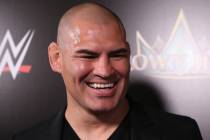 Cain Velasquez, left, and Rey Mysterio, are interviewed during a World Wrestling Entertainment ...