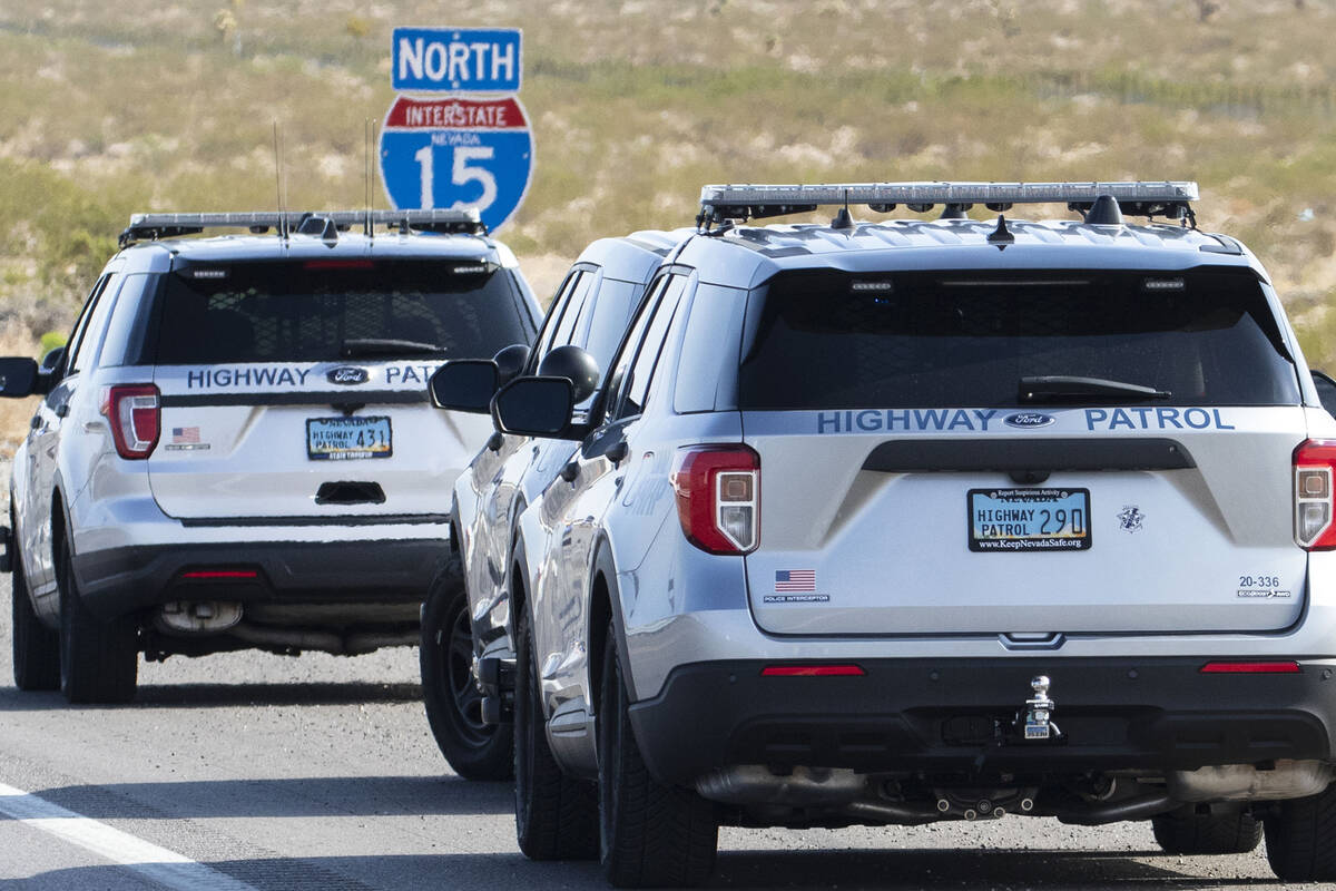 This Aug. 30, 2021, file photo shows Nevada Highway Patrol investigating a fatal crash on Inter ...