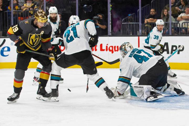 Golden Knights right wing Reilly Smith (19) shoots on San Jose Sharks goaltender James Reimer ( ...