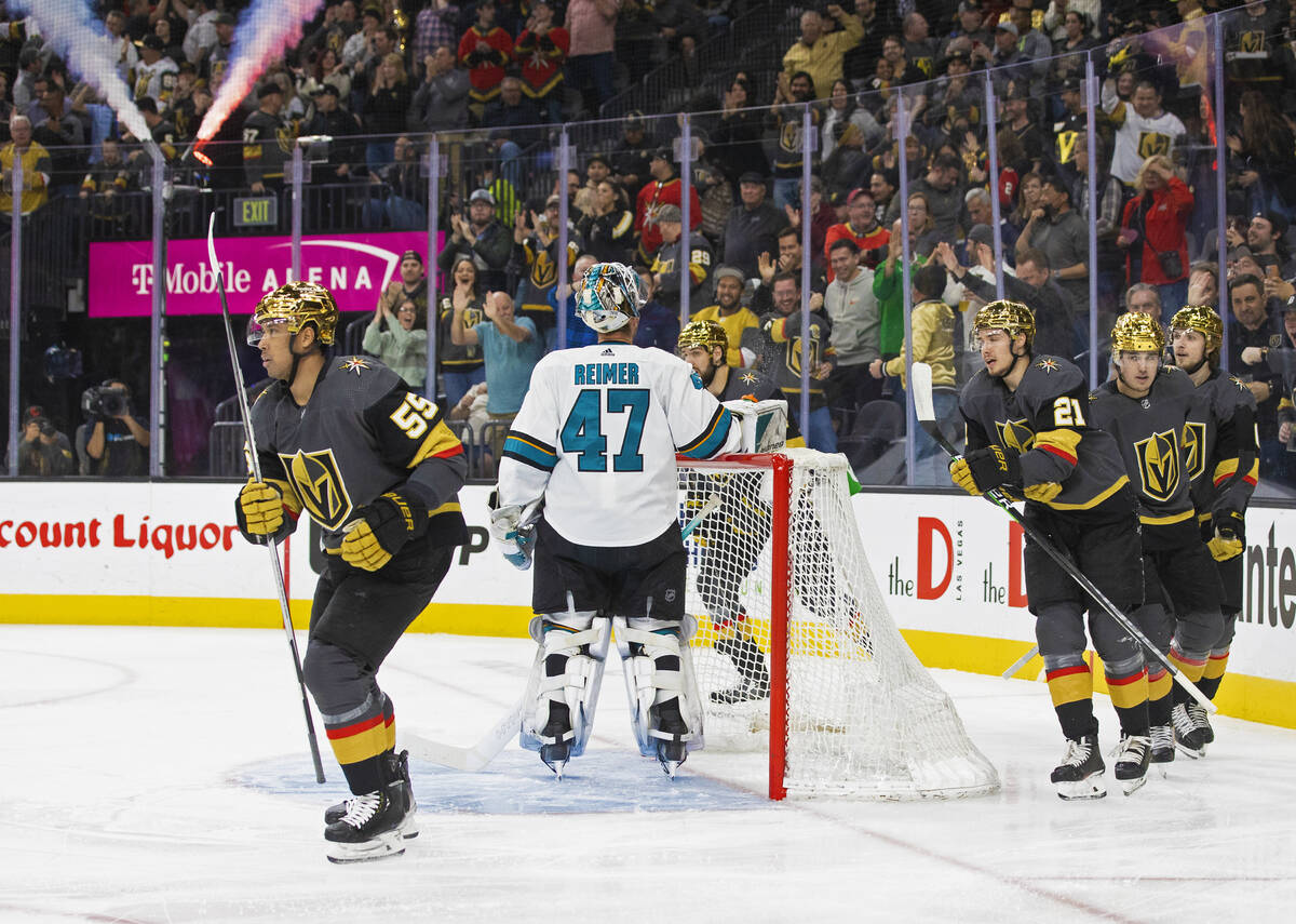 Golden Knights right wing Keegan Kolesar (55) celebrates a first period goal with teammates dur ...