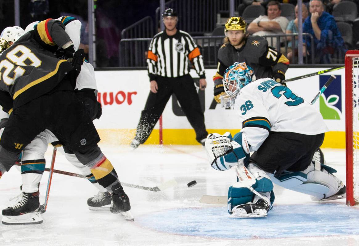 San Jose Sharks goaltender Zach Sawchenko (36) makes a save against Golden Knights center Willi ...