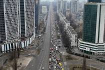 Traffic jams are seen as people leave the city of Kyiv, Ukraine, Thursday, Feb. 24, 2022. Russi ...