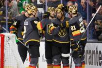 Golden Knights right wing Keegan Kolesar (55) celebrates a first period goal with teammates dur ...