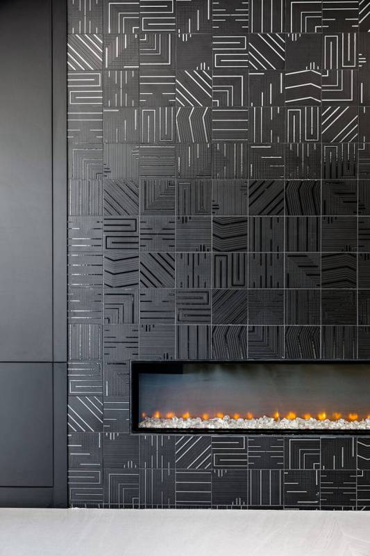 The lower-level fireplace. (Rob Jensen Co)