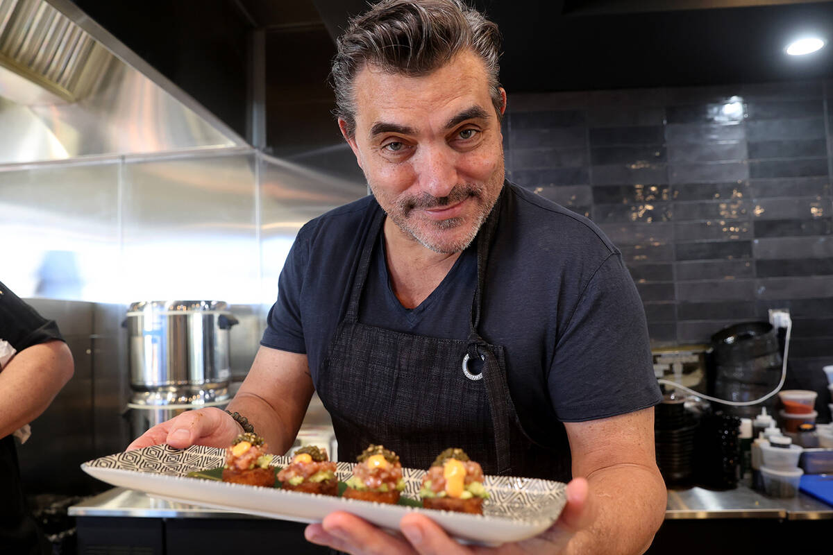 Celebrity Chef Todd English prepares Coconut Crispy Rice Fatty Tuna Tatar Caviar ahead of the o ...