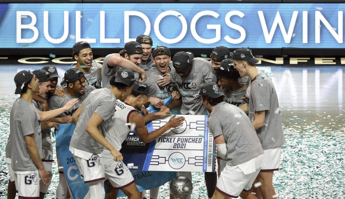 Gonzaga celebrates after they defeated BYU in an NCAA college basketball game for the West Coas ...