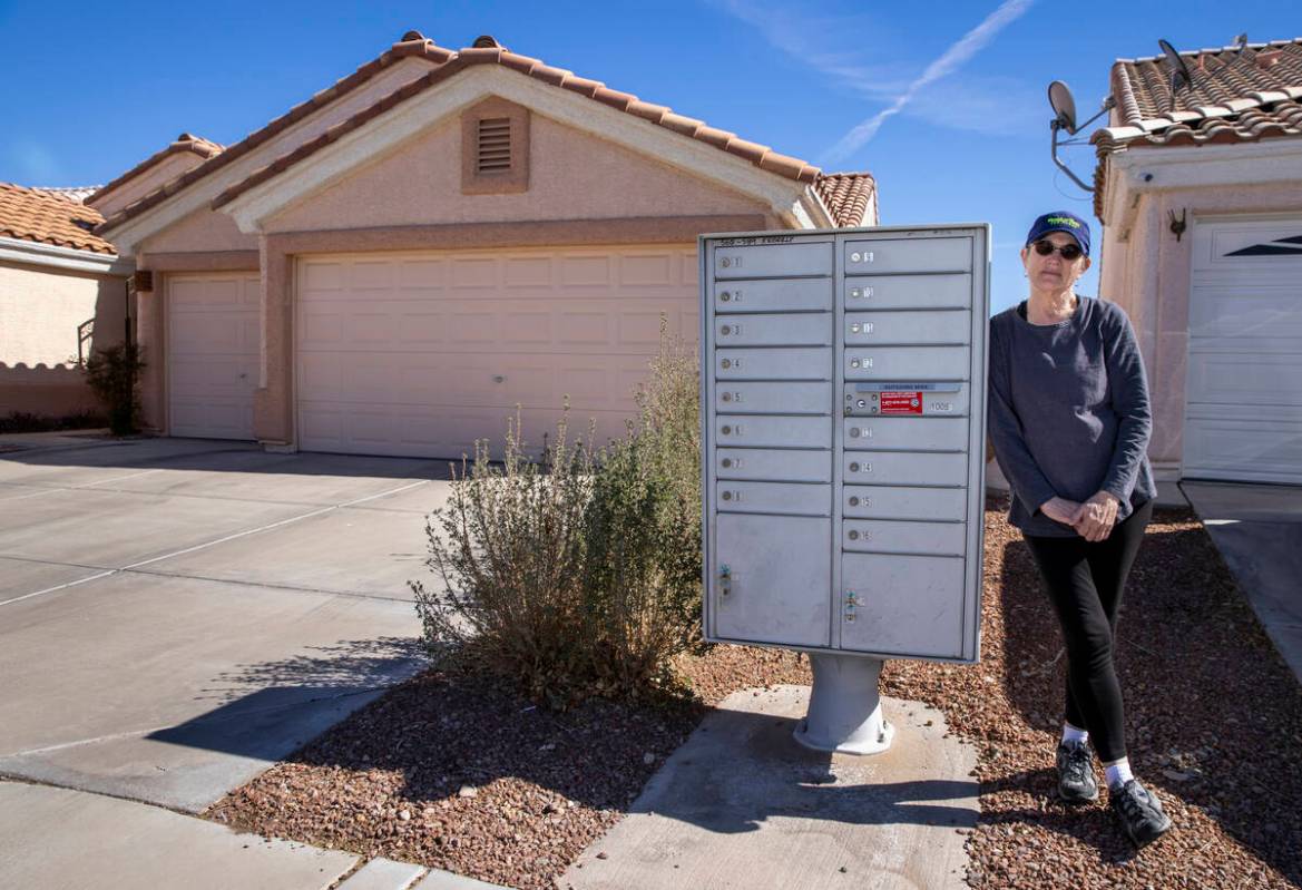 Katheryn Brown stands by the mailbox near her house on Wednesday, March 2, 2022, in Henderson. ...