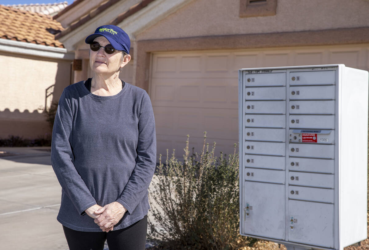 Katheryn Brown stands by the mailbox near her house on Wednesday, March 2, 2022, in Henderson. ...