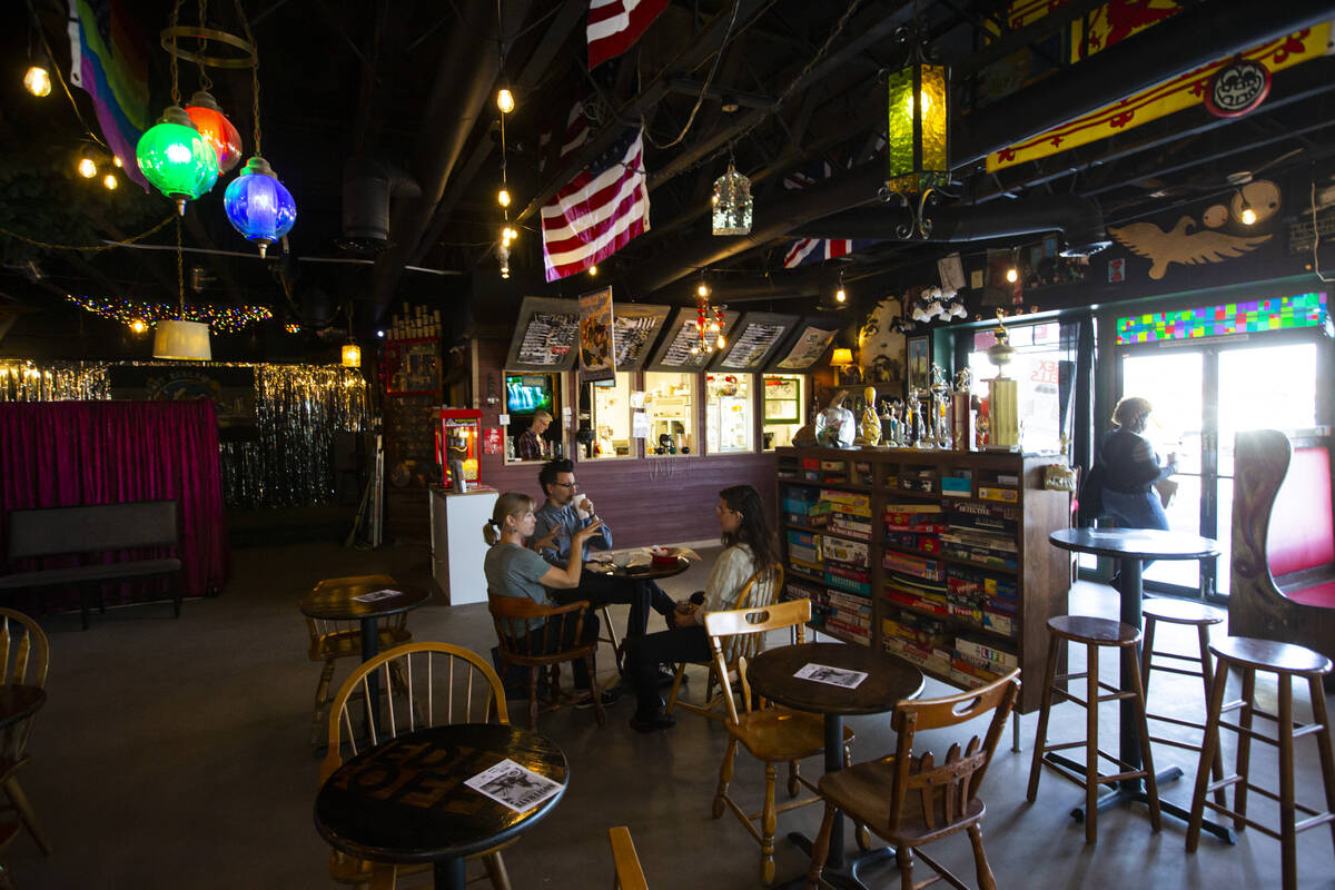 People chat and drink at Fort Bedlam coffee house in New Orleans Square on Thursday, March 3, 2 ...