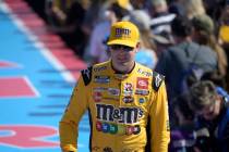 Kyle Busch walks down the stage during driver introductions before the NASCAR Daytona 500 auto ...