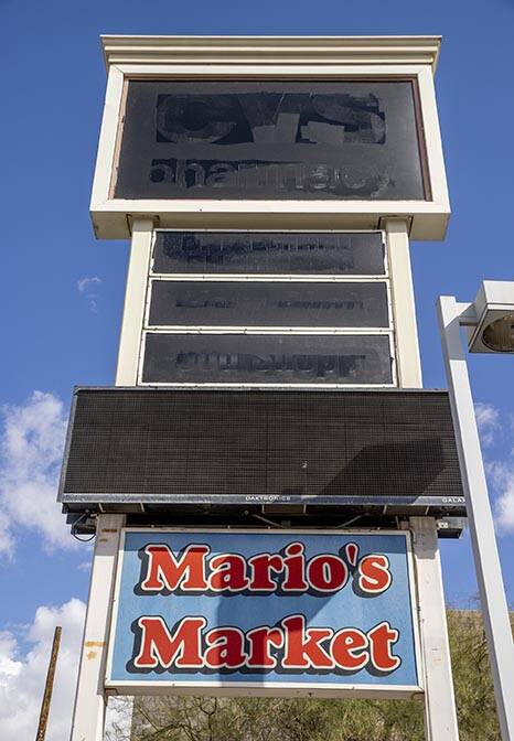 Signage in the parking lot of Mario's Westside Market with a possible move soon into the nearby ...