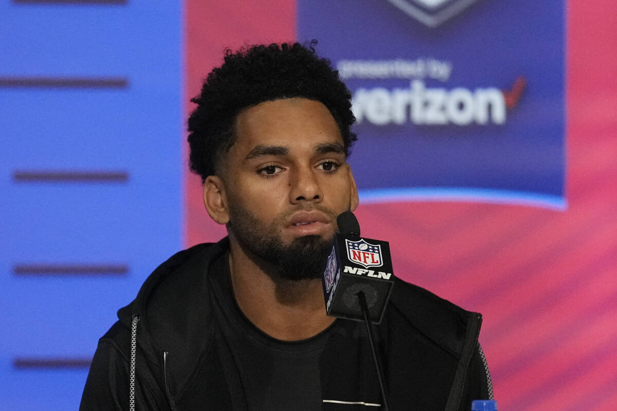 Ohio State wide receiver Chris Olave speaks during a press conference at the NFL football scout ...
