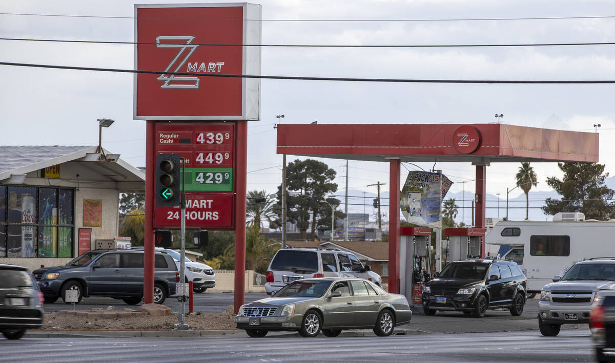 Customers pump gas at the Z Mart store along North Martin Luther King Boulevard on Friday, Marc ...
