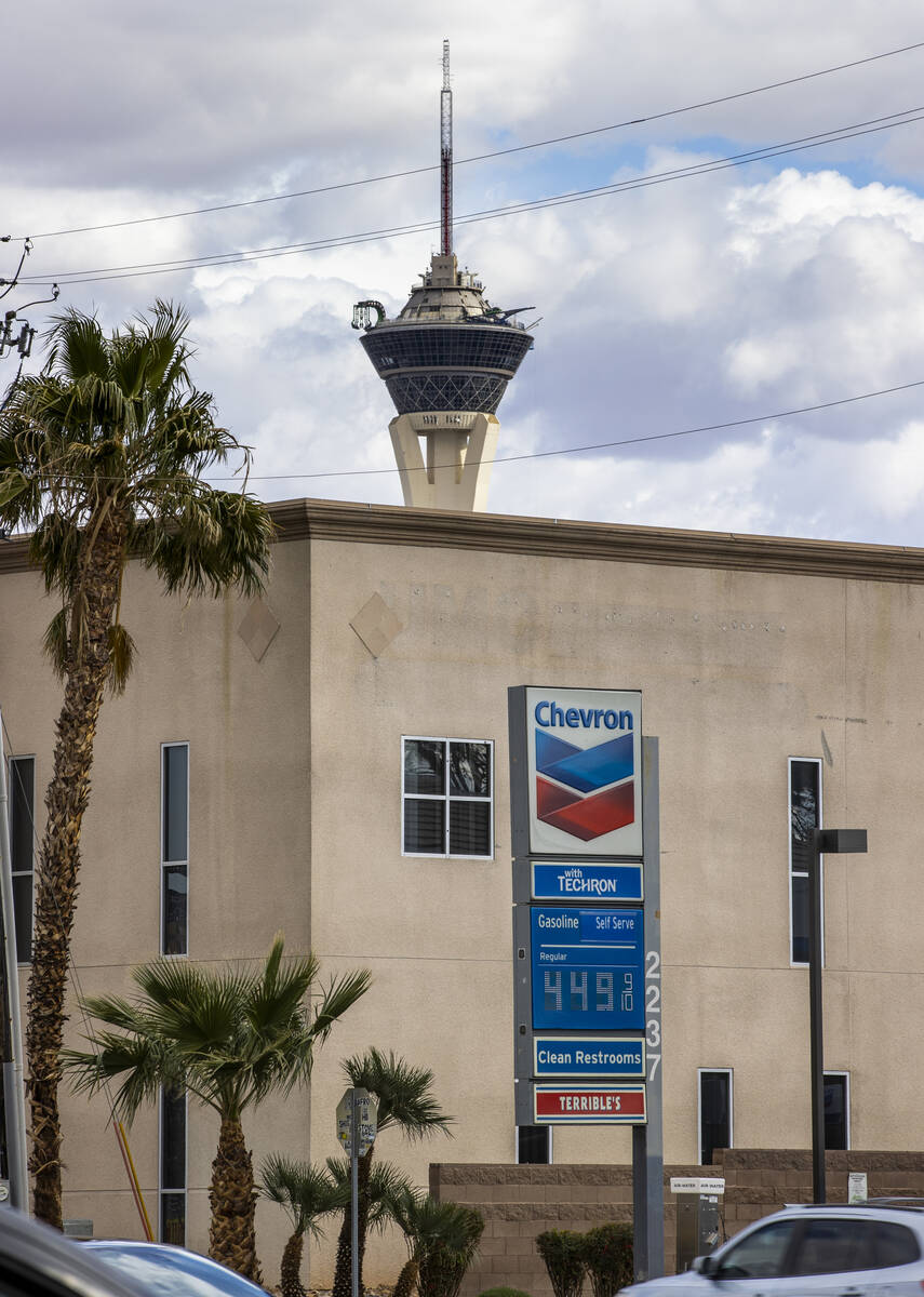 Sign for gas at the Chevron store along West Charleston Boulevard on Friday, March 4, 2022, in ...