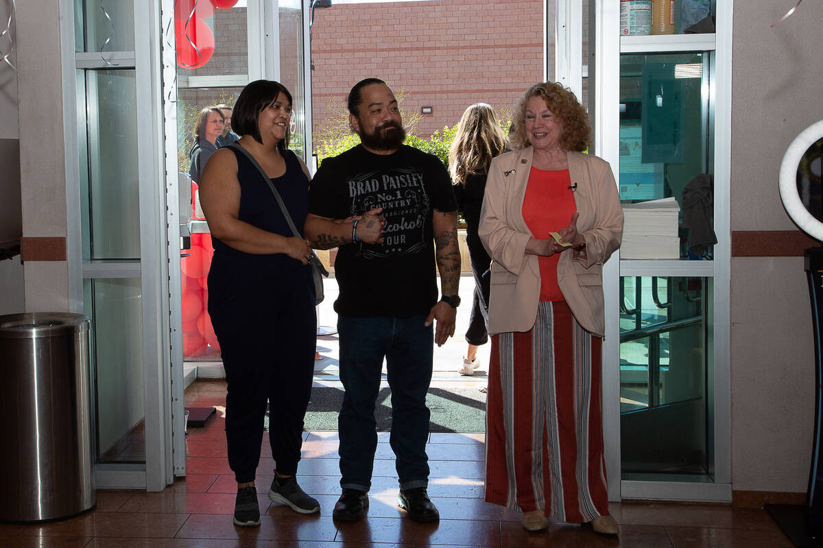 Mayra Ramirez and Luis Pantoja are shown with Clark County Clerk Lynn Marie Goya at Clark Count ...